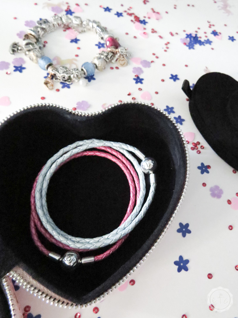 Pandora charm braclets inside a jewelry box